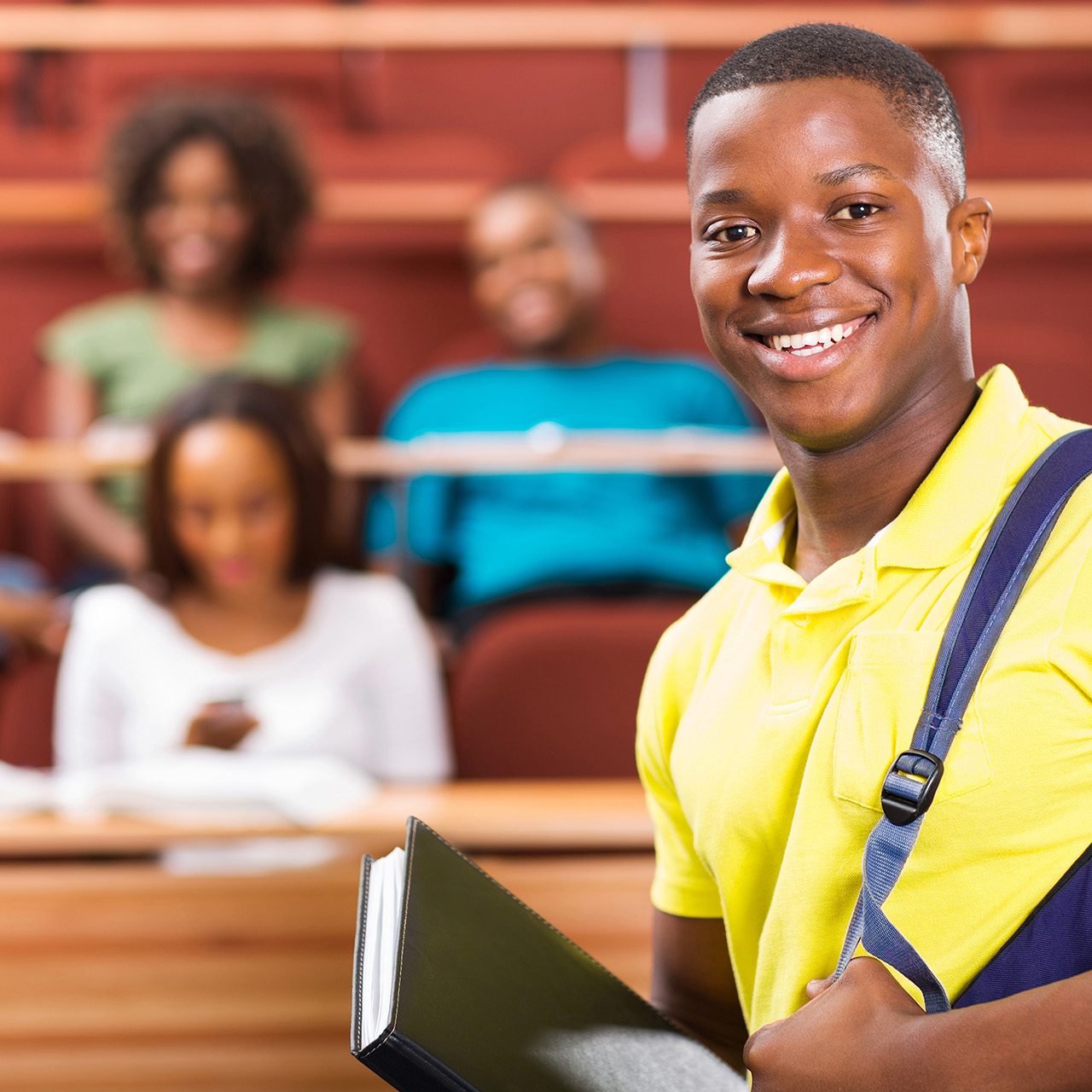 handsome african american college student in lecture hall